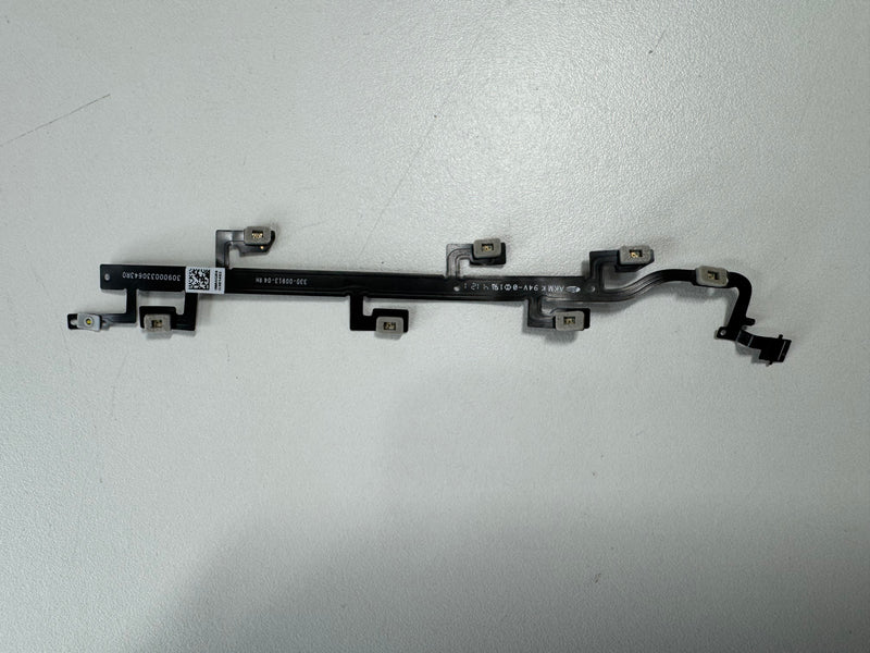Closeup of a disconnected Meta Quest 2 controller sensor cable, showing the thin ribbon connector that links the tracking ring LEDs to the main circuit board.